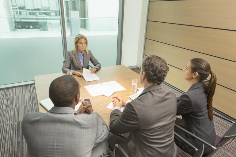 Personas en una reunión corporativa